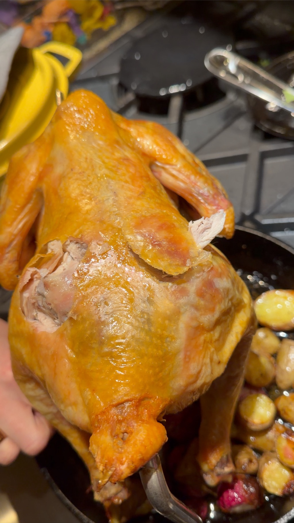 Close-up of the crispy golden skin with oyster meat being eaten